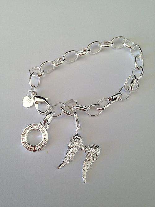 Designer's Silver bracelet with a Angel's Wings Charm*imported