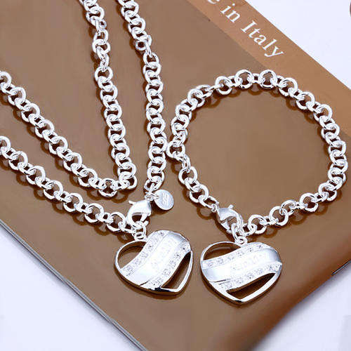 Designer's Guess Heart-Shaped Silver Bracelet and Necklace Set
