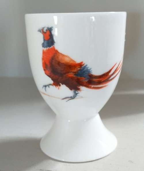 THREE HANDPAINTED EGG-CUPS BY JANE ABBOTT