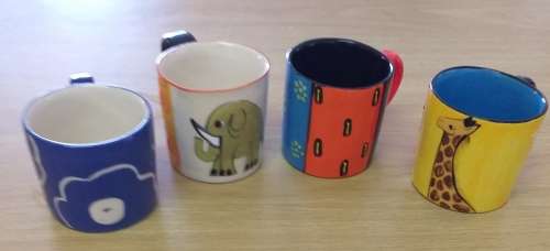 FOUR CERAMIC , ELSONA HAND PAINTED ESPRESSO MUGS