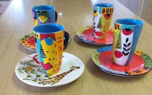 FOUR ESPRESSO CERAMIC CUPS AND SAUCERS BY ELSONA CERAMICS