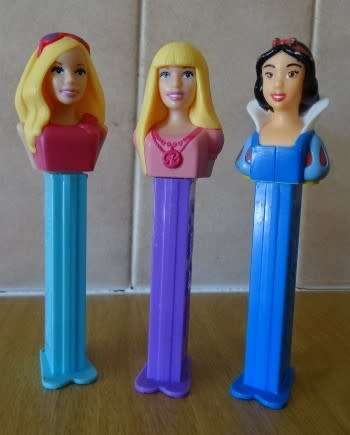 THREE WALT DISNEY PEZ DISPENSERS, SNOW WHITE AND OTHERS
