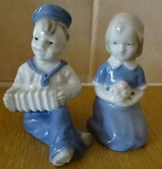 TWO GRAFENTHAL PORCELAIN FIGURINES, BOY AND GIRL (PARTIALLY MARKED)