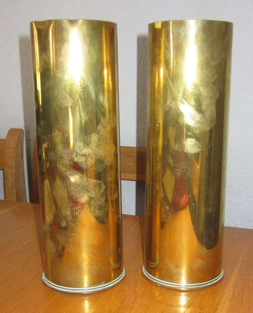 TWO 25 pounder brass cases.