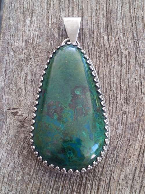 Solid Sterling silver bezel and dark green malachite pendant. Large.