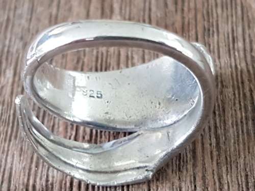 Golf ring. Two gold golf sticks on a sterling silver ring. Interesting design. 12.2 grammes