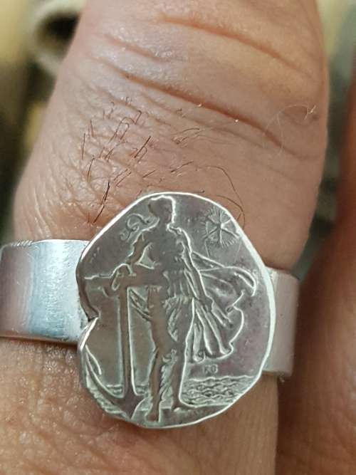 Solid Silver Shilling Angel Ring 1941 Cape of Good Hope. 8.6 grams solid silver. Size U ( men`s )