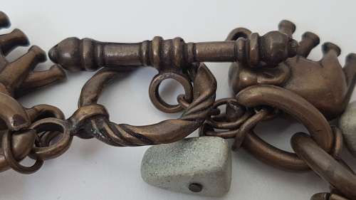 NEW never worn Designer Charm Bracelet! Detachable Bronze Metal Elephants and Soapstones. 20 cm.