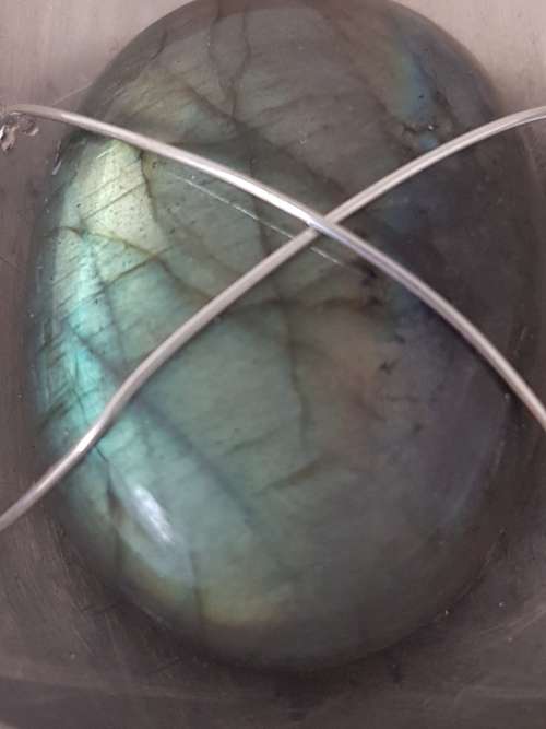 Namibian Labadorite in large teardop solid silver setting with silver wire. 24.4 g!