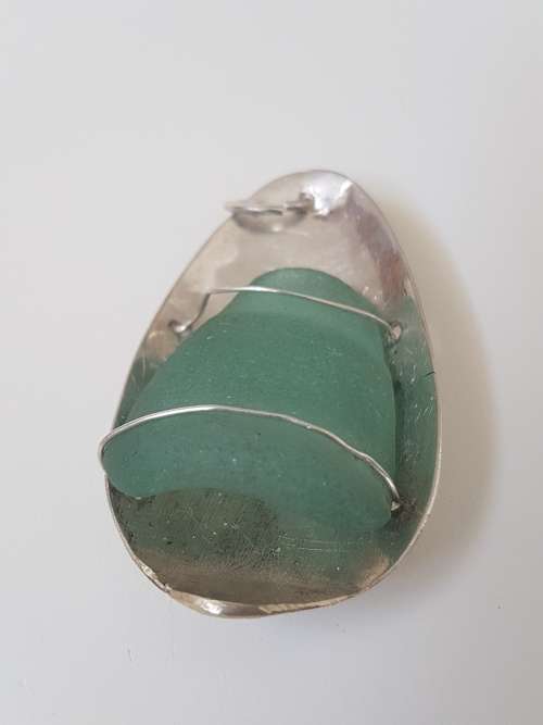 Smoky Seaglass in solid silver oval  setting with silver wire. 9.9  g!