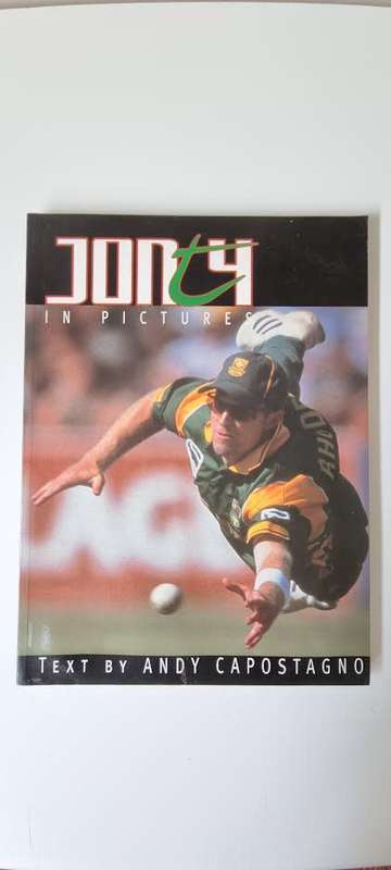 Jonty in Pictures. Signed and Inscribed by Jonty Rhodes.