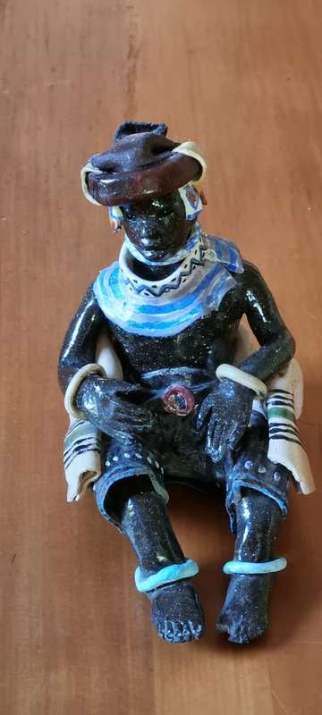 Original unique ceramic figurine. Xhosa Youth by Elizabeth Rowland. With detailed description.