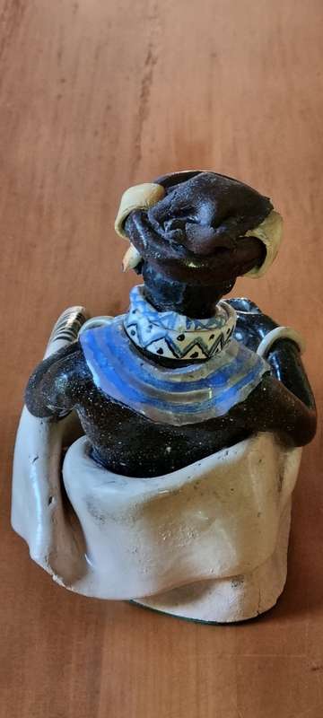 Original unique ceramic figurine. Xhosa Youth by Elizabeth Rowland. With detailed description.