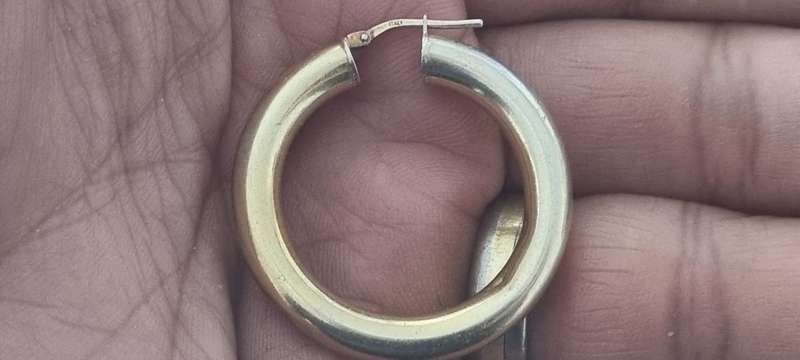 ITALY 925 marked sterling silver 3.6 gram large LARGE SINGLE hoop earring. 4 dents. Gold plated.