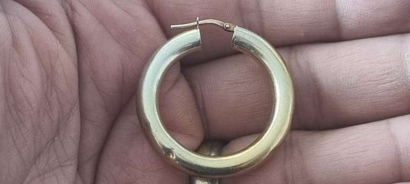 ITALY 925 marked sterling silver 3.6 gram large LARGE SINGLE hoop earring. 4 dents. Gold plated.