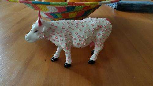 sMOOch Cow. Animal  Figurine. Funky ornament. Cow with pink lip kisses all over it!