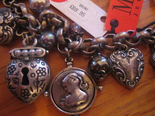 HUGELY REDUCED NEW intricate charm bracelet marked 69.95 pounds by Miglio of U.K.