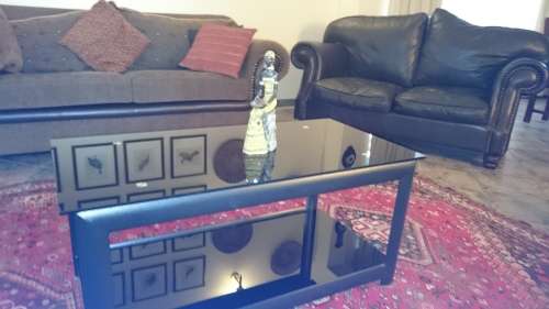 Coffee table 2 tier black glass and steel