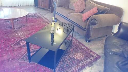 Coffee table 2 tier black glass and steel