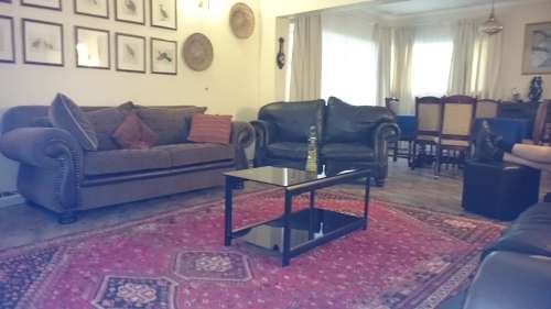 Coffee table 2 tier black glass and steel