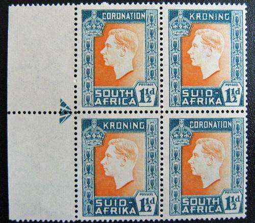 1937 Coronation 1 1/2d mouse and moles on neck flaw.