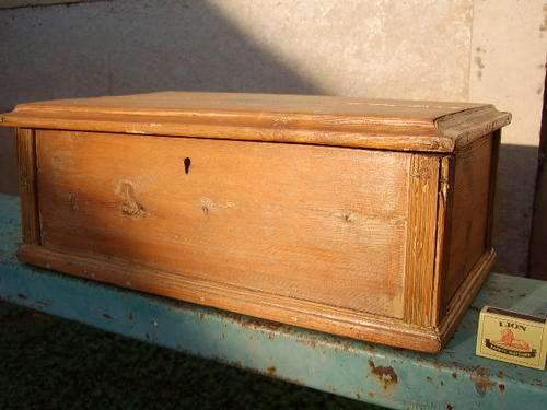 Wooden box with hinged lid