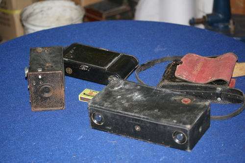Three antique camera's on offer here, enjoy the auction