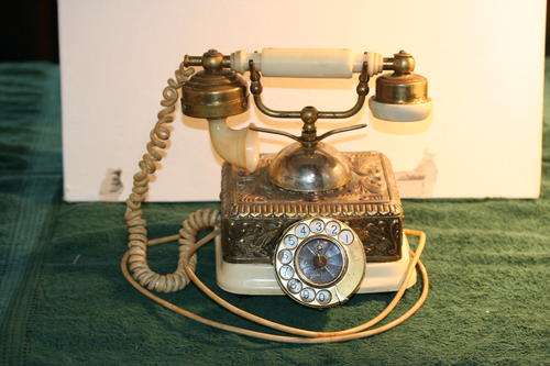Antique looking old telephone on offer
