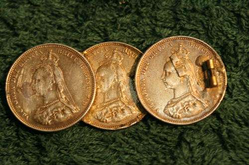 Have no idea what these three coins are? maybe brass or gold?