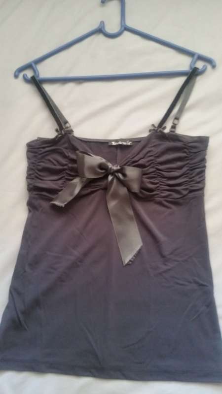 Silky grey strappy blouse, with bow detail