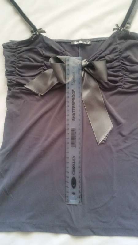 Silky grey strappy blouse, with bow detail