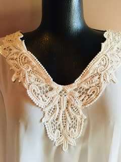Cream tunic top size: 12