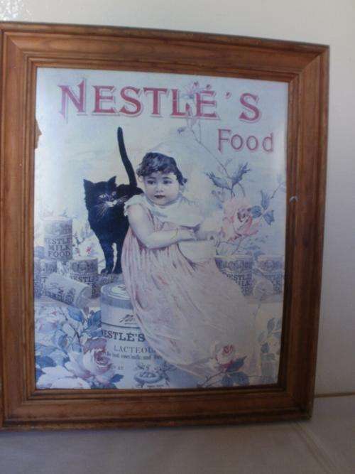 FRAME WITH A VINTAGE ADVERTISING PICTURE OF NESTLE FOOD'S