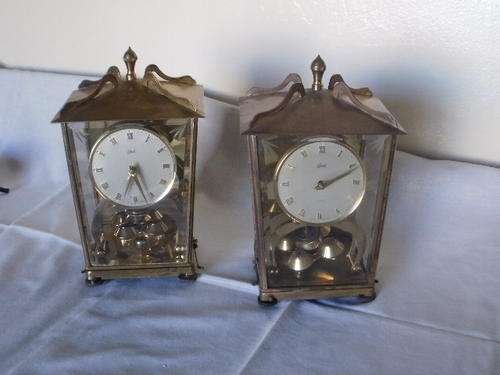 A PAIR OF 400 DAY ANNIVERSARY CLOCK'S