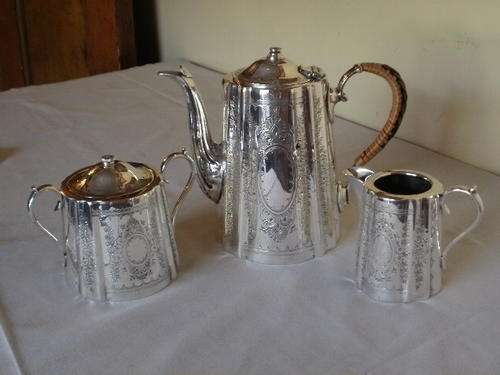 THREE PIECE VICTORIAN TEA SET ( WORDS CAN NOT DESCRIBE THIS)