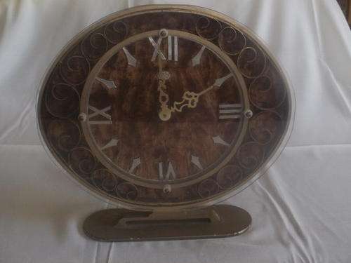 WROUGHT IRON  CLOCK WITH VELVET BACK GROND