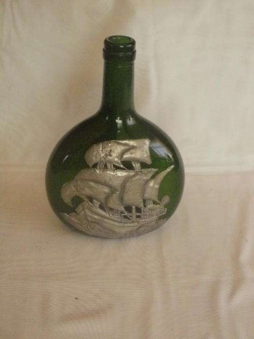 GREEN BOTTLE WITH PEWTER OVERLAY