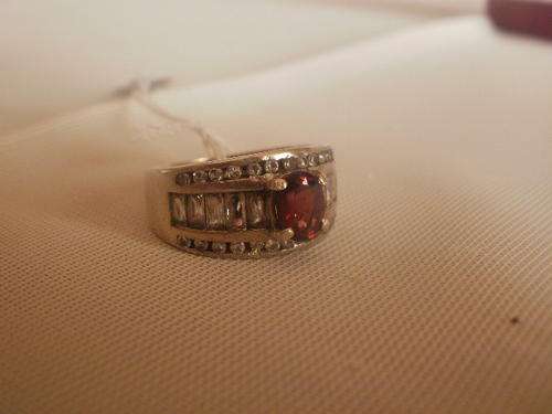 925 SILVER RING WITH A GARNET AND CRYSTALS