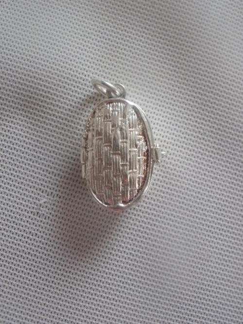 SILVER MOSES IN HIS BASKET CHARM
