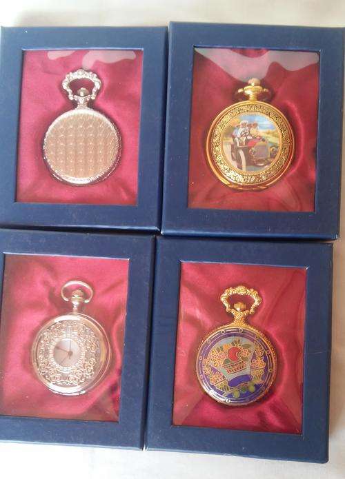FOUR QUARTZ POCKET WATCHES (Q)