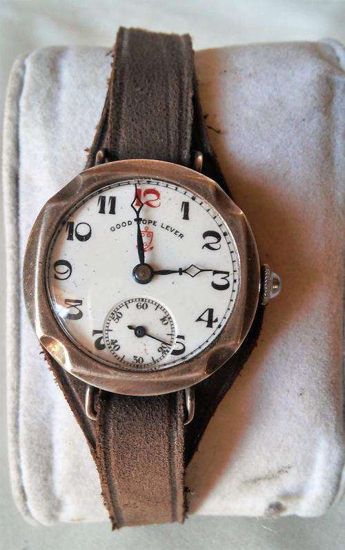 CIRCA 1920'S SILVER "GOOD POPE LEVER" WATCH WITH LEATHER STRAP