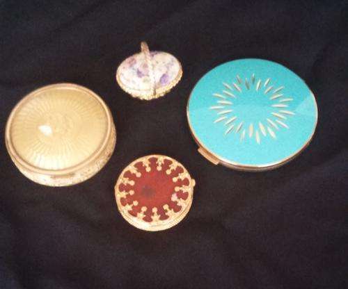 TWO POWDER COMPACT'S AND TWO PERFUME HOLDERS