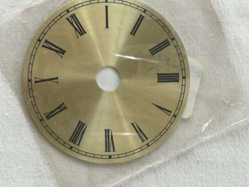 Clock: Small Quartz gold metal dial - 100mm(a)
