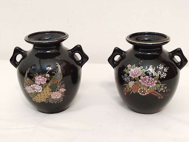 Two black vases