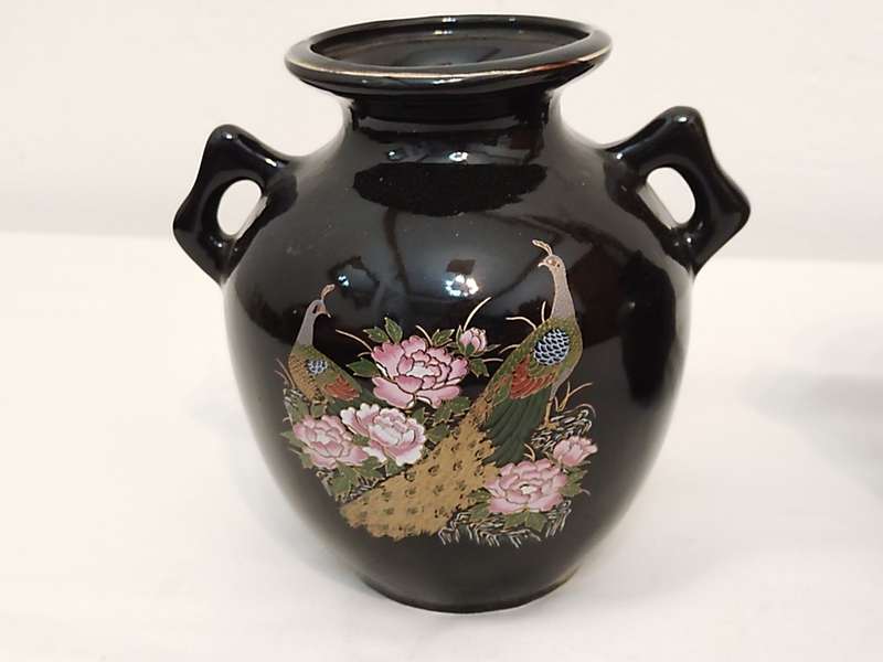 Two black vases