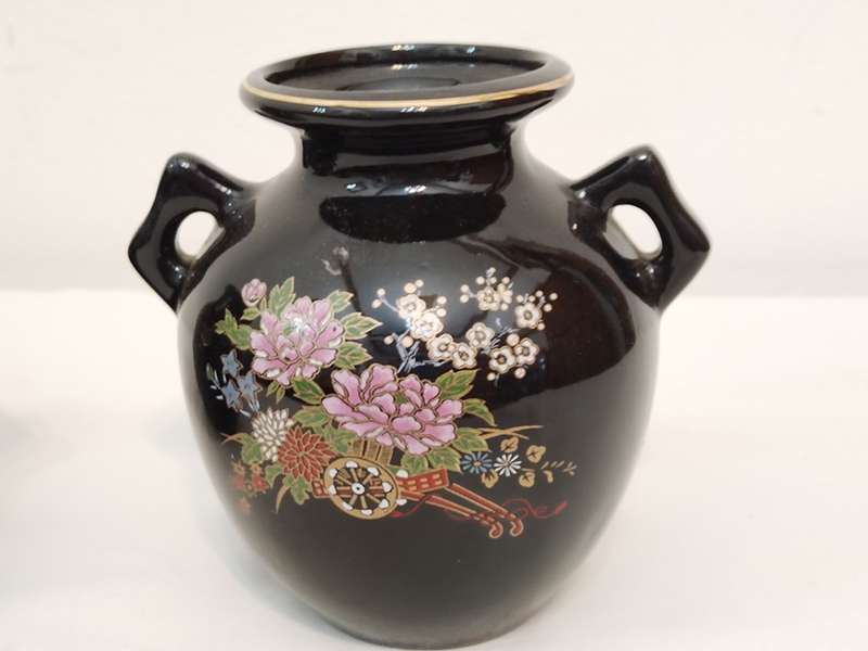 Two black vases