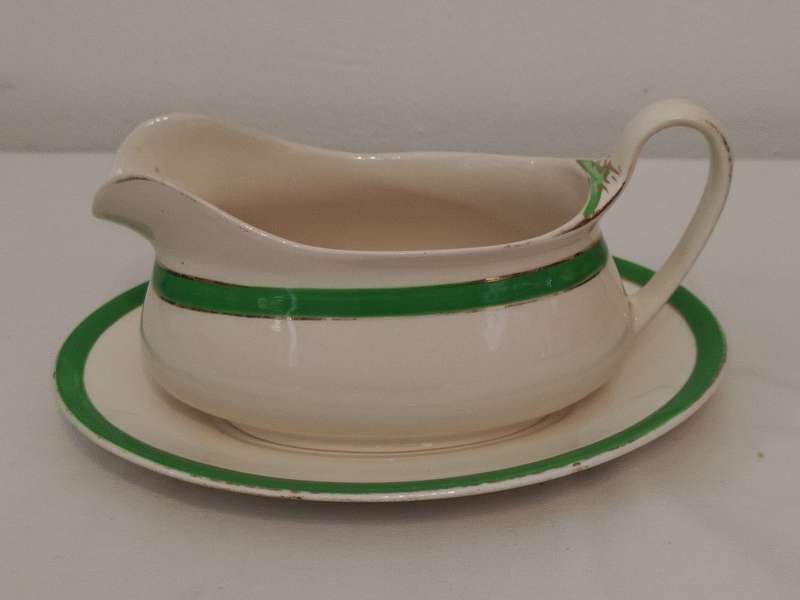 Queens Green, Solian Ware. Simpsons (potters) Ltd, Cobridge England Sauce boat with underplate