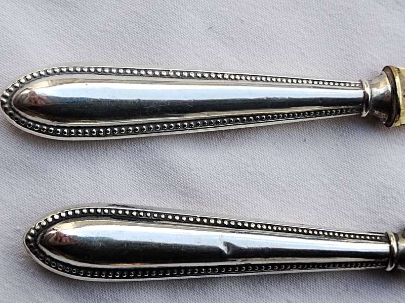 Two 830 Silver cheese knifes