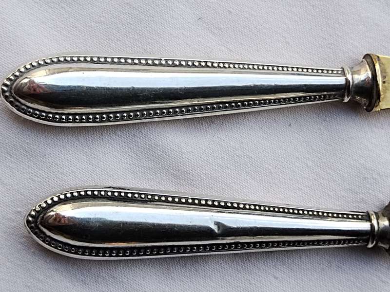 Two 830 Silver cheese knifes