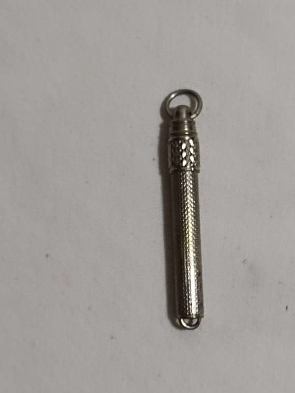 Vintage retracting button hook